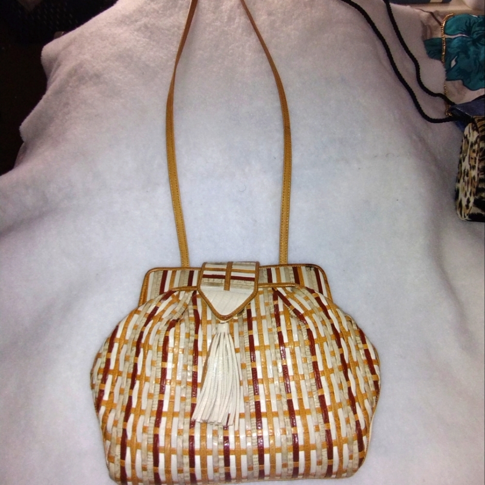 Sharif Woven tassel crossbody purse Measures 8 1/2  inches on the inside